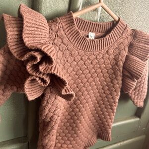Soft knitted infant onesie